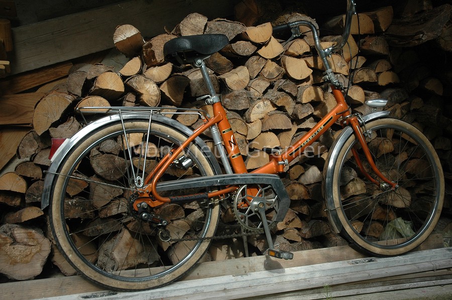 Vélo pliant peugeot orange